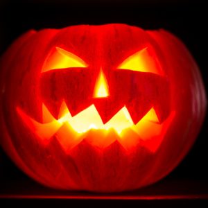 Scary halloween pumpkins jack-o-lantern candle lit