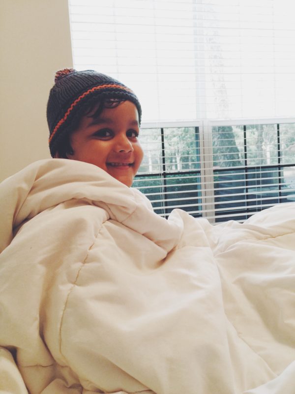 Comfy and Cozy #comforter #toddler #smiling #winters #indoor