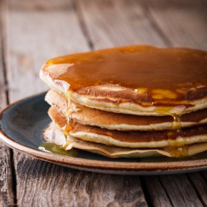 Pancake folded stack of with liquid honey